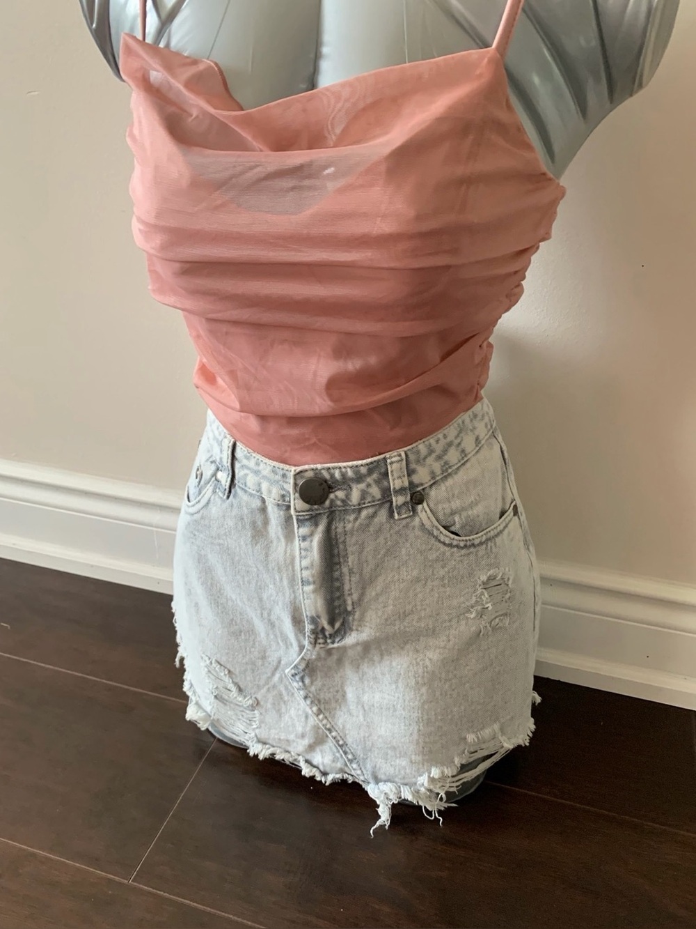 Signature Light Wash Distressed Denim Mini Skirt